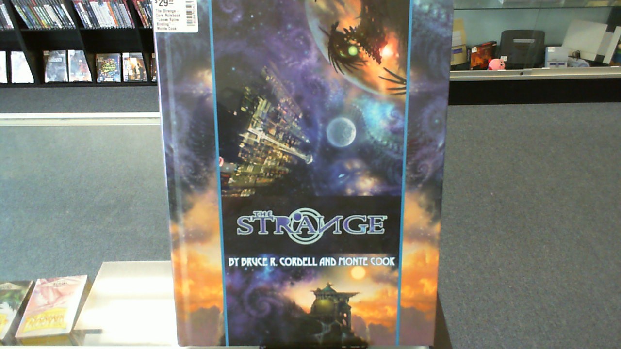 The Strange- Core Rulebook *Loose Spine Binding*- Monte Cook Games